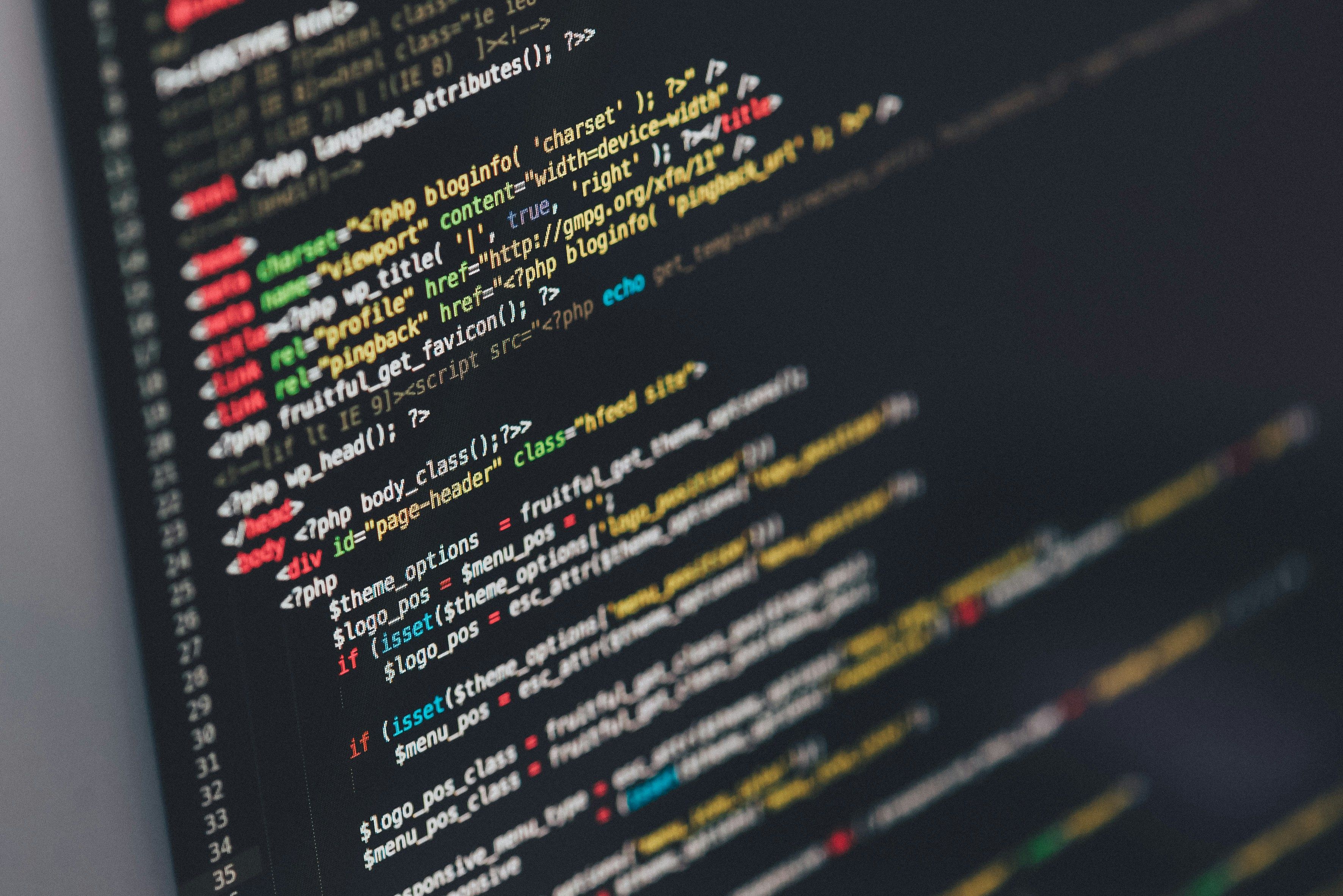 a close up of a computer screen with a lot of code on it .